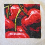 Картина со спелыми вишнями, выполненная в технике вышивания бисером